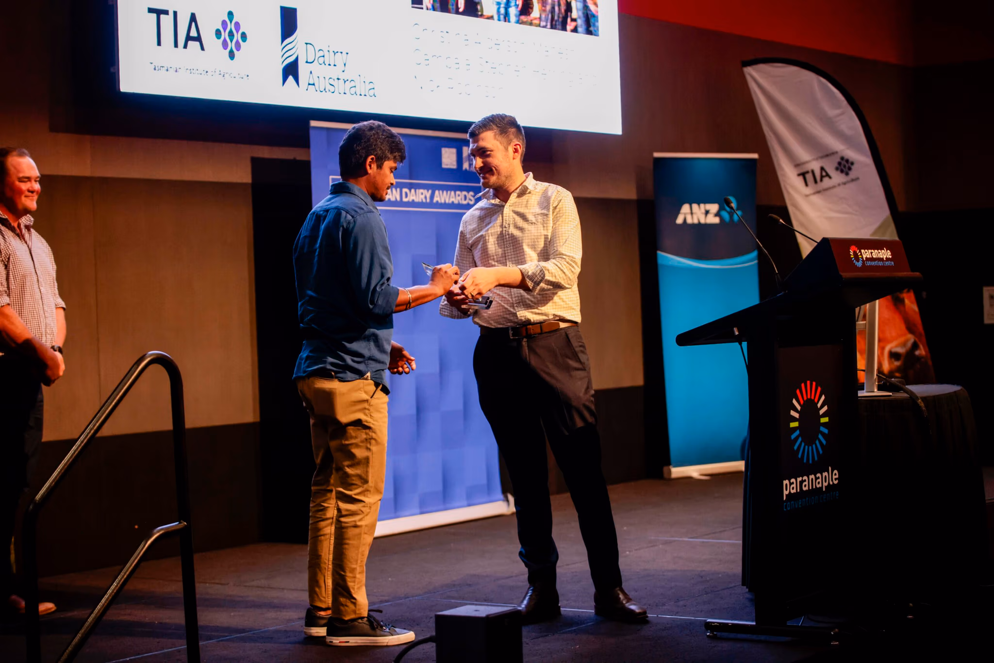 Mahesh Gampala receiving his Dairy Business of the Year Award. Picture supplied by DairyTas Dairy Australia